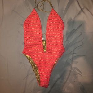 Deep plunge one piece bathing suit